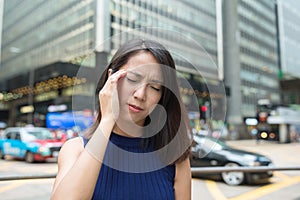 Woman feeling headache