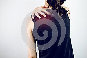 Woman Feeling Pain In The Shoulder