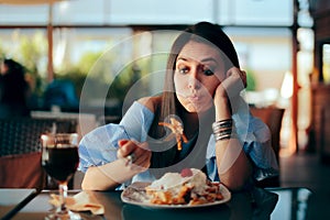 Woman Feeling Sick While Eating Huge Meal