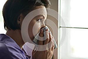 Woman feels sickness at home