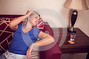 Woman feels strong headache. People, healthcare and medicine concept