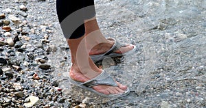 Woman Feet In Flip-Flop