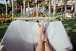 Woman feet in hammock