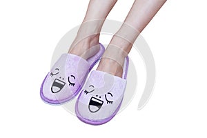 Woman feet with smile slippers and happy, close up view, on whit