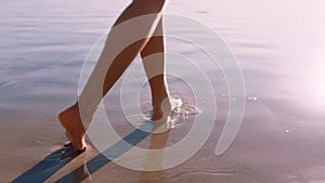 Woman, feet or walking by beach, ocean or sea in tropical travel location, summer holiday or vacation break for zen