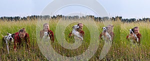 a woman in a field with her beloved pet on a walk.