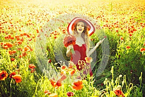 Woman in field of poppy seed in retro hat