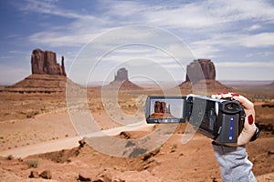 Woman filming in Monument Valley