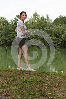 Woman Fishing at a lake