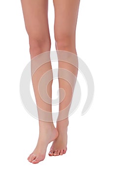 Woman fit legs steping on white