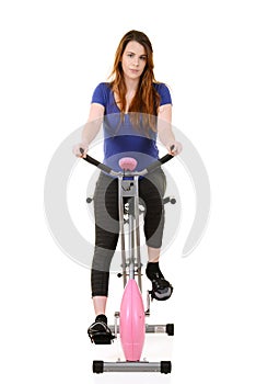 Woman fitness cardio workout on an exercise bike