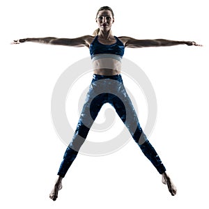 Woman fitness excercises jumping silhouette