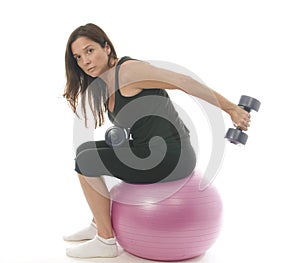 Woman fitness exercising dumbbell weights cor