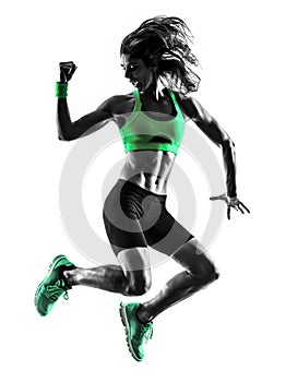 Woman fitness jumping exercises silhouette