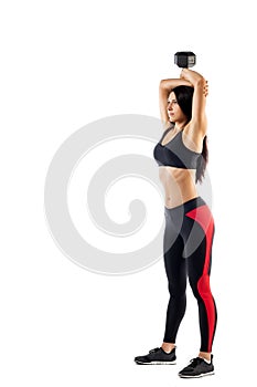 woman fitness model of a brunette doing an exercise with a dumbbell
