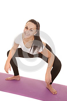 Woman fitness squat smile