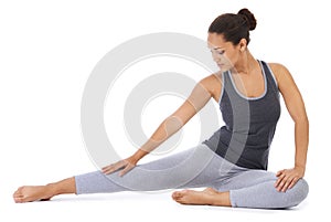Woman, fitness and stretching body in studio for workout, exercise or yoga on a white background. Female person in zen