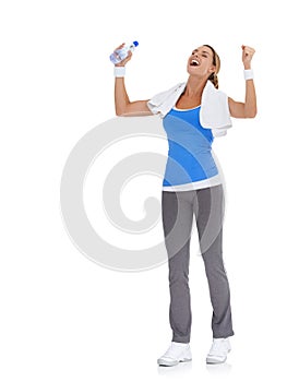Woman, fitness success and celebration in studio with water bottle for exercise, workout success or body goals. Excited