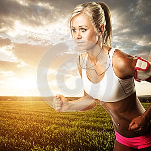 Woman fitness workout - running wheat field