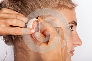 Woman fitting wiht hearing aid