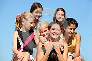 Woman and five girls photo