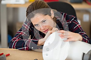 woman fixing coffee machine