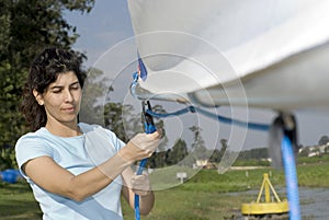 Woman Fixing Sail - Horizontal