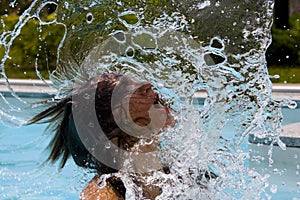 Woman flipping wet hair