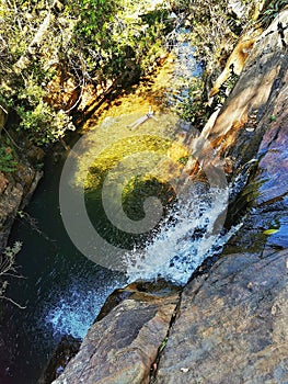 Woman floating in water at Waterfall Cruzados at AcuruÃÂ­, Minas Gerais, Brazil photo