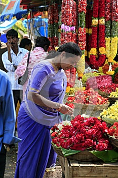 Woman on flower, fruit & vegetable market, Bangalore