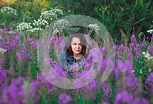 Woman on a flower meadow
