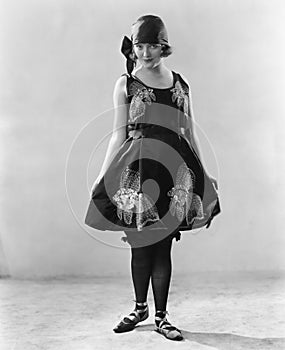 Woman in a flowered dress and ballerina shoes