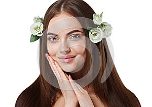 Woman with flowers in hair beautiful portrait with long amazing hair.