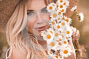 Woman with flowers outdoors