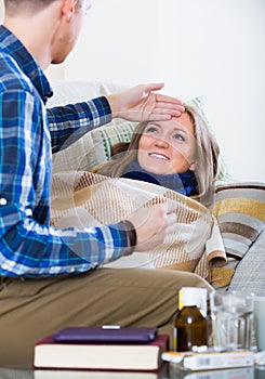 Woman with flue and nursing