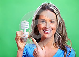Woman with a fluorescent bulb