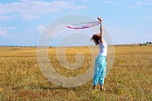 Woman with flutter ribbons photo