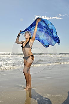 Woman with fluttering sarong