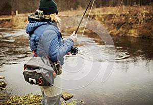 woman fly fishing angler
