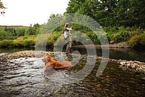 Woman Fly Fishing Small Stream For Trout