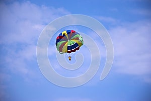 Flying paraglider