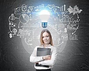 Woman with a folder and her idea, blackboard