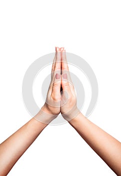 Woman folds hands for prayer or plea, white background
