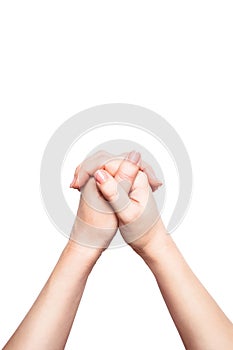 Woman folds hands for prayer or plea, white background