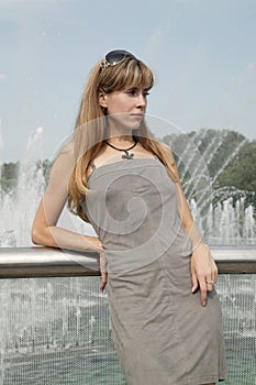 Woman at a fontain photo