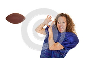 Woman football player afraid to catch ball