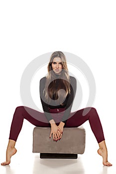 Woman on a footstool
