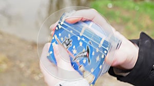 Woman in the forest guessing on tarot cards, shuffling tarot cards