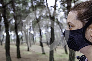 Woman with forest mask photo