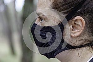 Woman with forest mask photo